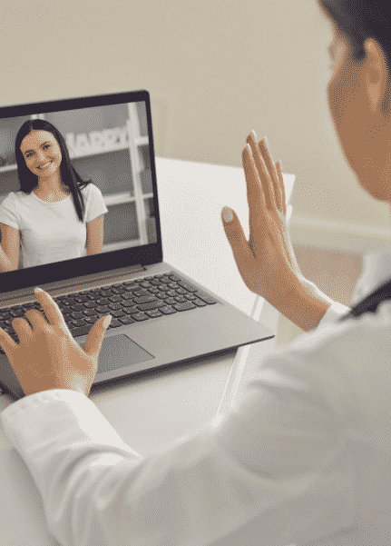 doctor on an appointment with a patient, showcasing telemedicine technology.