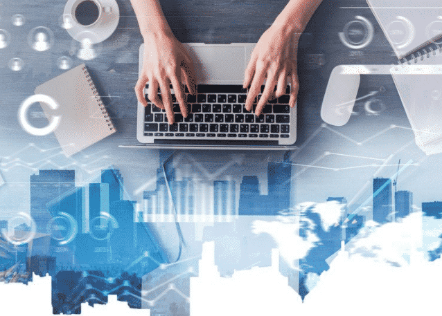 person typing on a laptop with different technology platforms in the background